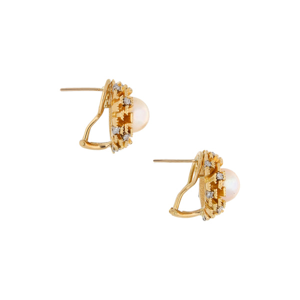 Aretes estilizados con diamantes y perlas en oro amarillo 18 kilates.