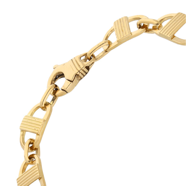 Pulsera eslabón combinado en oro amarillo 14 kilates.