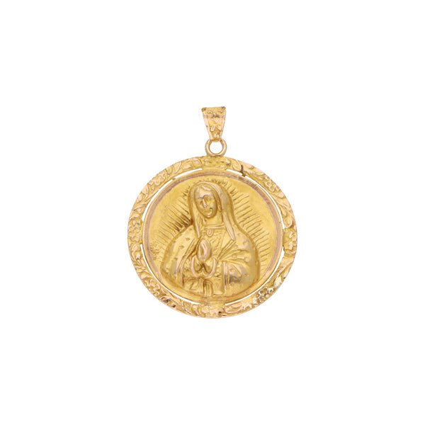 Medalla calada motivo Virgen de Guadalupe en oro amarillo 10 kilates.