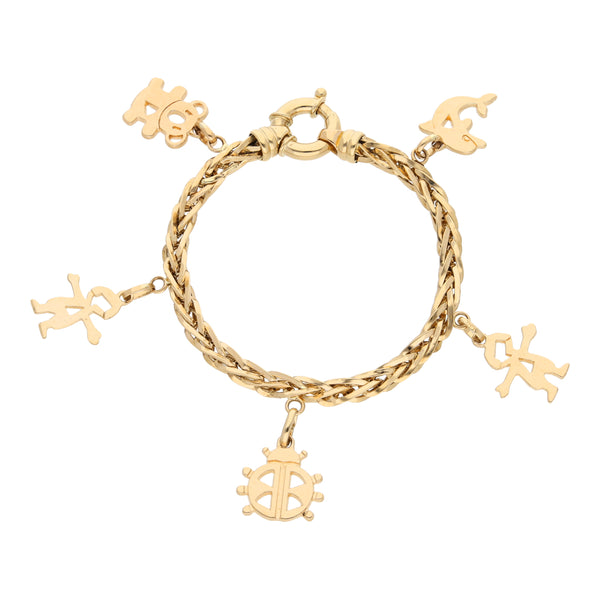 Pulsera eslabón tejido con colgantes en oro amarillo 14 kilates.