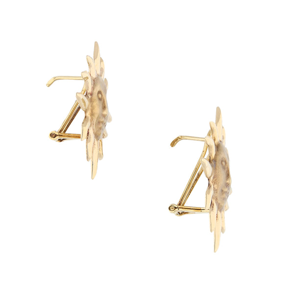 Aretes huecos motivo sol en oro amarillo 14 kilates.