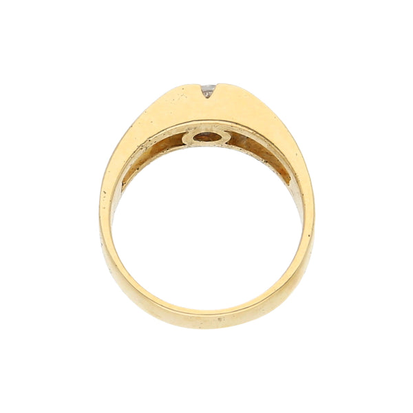 Anillo calado con circonia en oro amarillo 14 kilates.