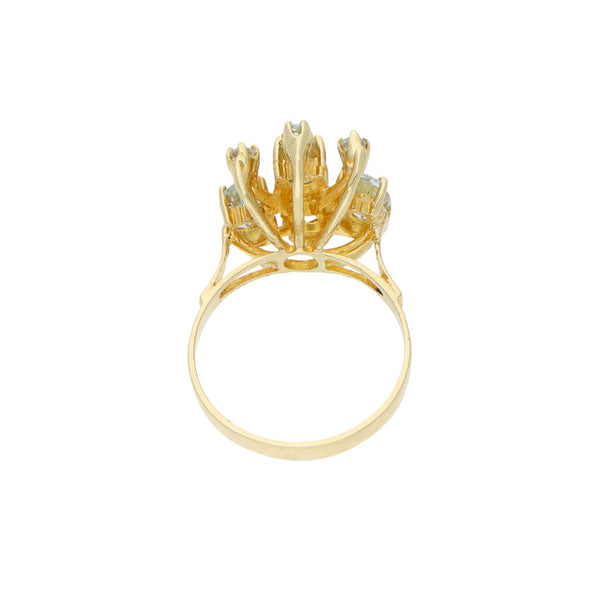 Anillo diseño especial con sintéticos en oro amarillo 14 kilates.