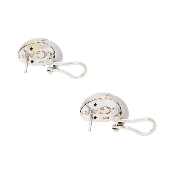 Aretes huecos en oro blanco 14 kilates.