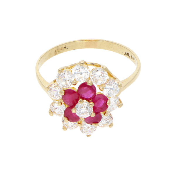 Anillo calado motivo floral con rubíes y circonias en oro amarillo 14 kilates.