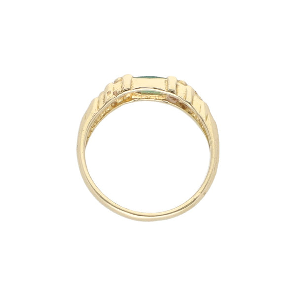 Anillo diseño especial con esmeralda y circonias en oro amarillo 14 kilates.