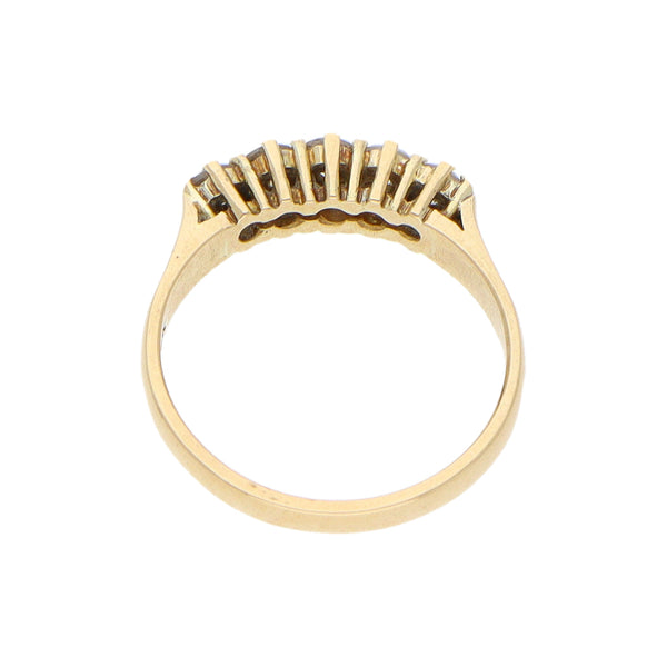 Anillo diseño especial con diamantes en oro amarillo 14 kilates.