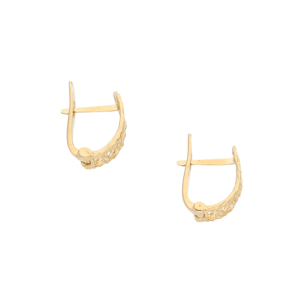 Aretes calados en oro amarillo 14 kilates.