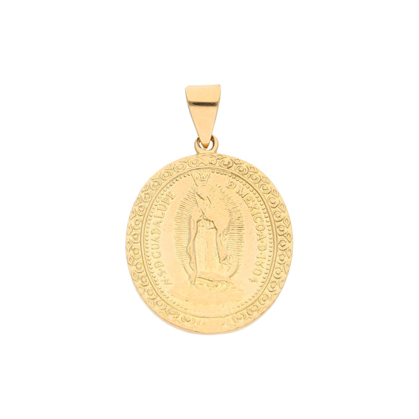 Medalla troquelada motivo Virgen de Guadalupe en oro amarillo 18 kilates.