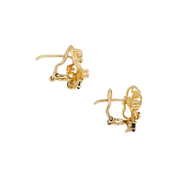 Aretes estilizados con zafiros y circonias en oro amarillo 14 kilates.