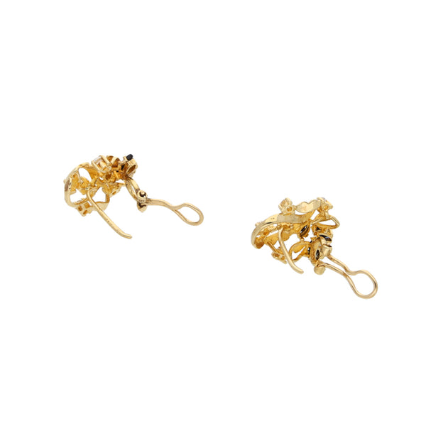 Aretes estilizados con zafiros y circonias en oro amarillo 14 kilates.