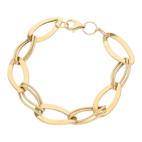 Pulsera eslabón combinado en oro amarillo 14 kilates.