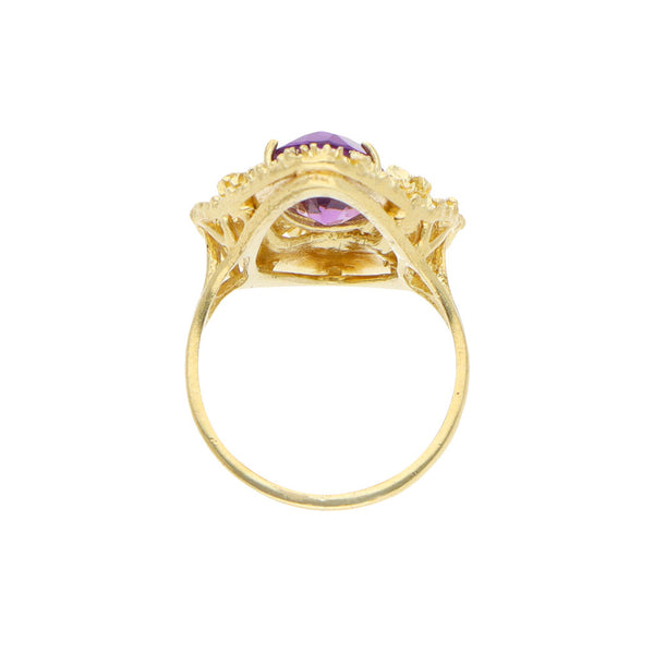 Anillo diseño especial con sintético en oro amarillo 18 kilates.