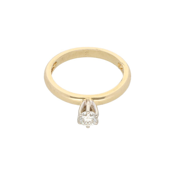 Anillo solitario con diamante en oro amarillo 14 kilates.