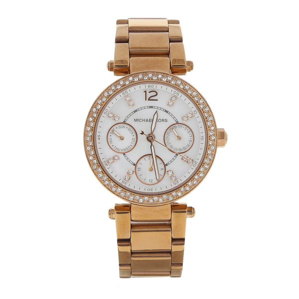 Reloj Michael Kors para dama en acero chapa.