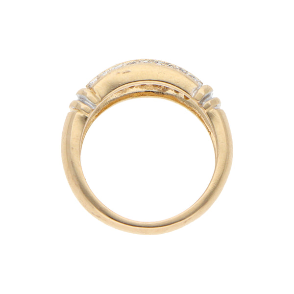 Anillo estilizado con diamantes en oro amarillo 14 kilates.