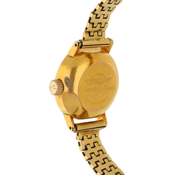 Reloj Tissot para dama modelo SeaStar Seven correa oro amarillo 18 kilates.