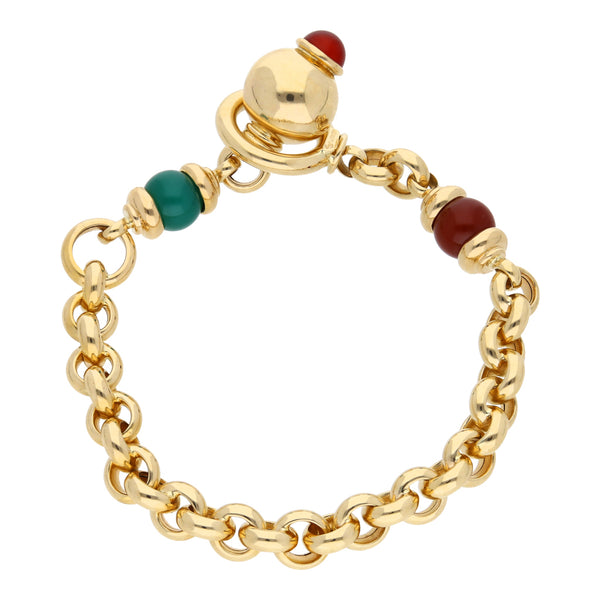 Pulsera eslabón cruzado con aplicaciones, sintéticos y colgante en oro amarillo 14 kilates.