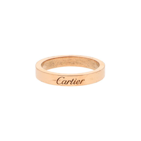 Argolla lisa firma Cartier en oro rosa 18 kilates.