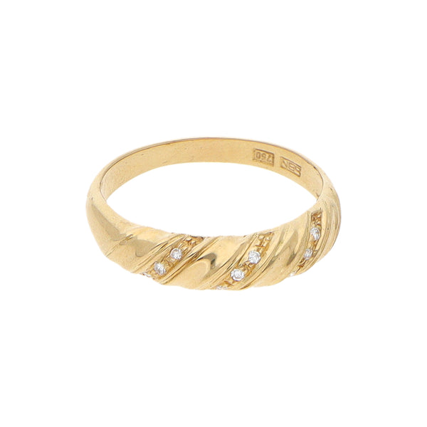 Anillo acanalado con diamantes en oro amarillo 18 kilates.