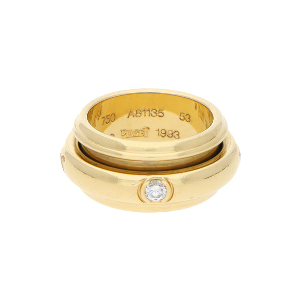 Argolla giratoria firma Piaget con diamante en oro amarillo 18 kilates.