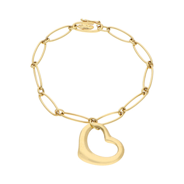 Pulsera eslabón combinado con colgante motivo corazón firma Tiffany & Co. en oro amarillo 18 kilates.