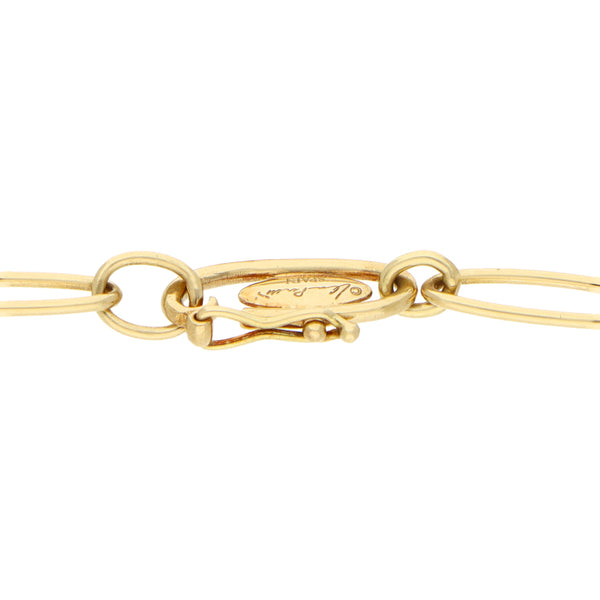 Pulsera eslabón combinado con colgante motivo corazón firma Tiffany & Co. en oro amarillo 18 kilates.