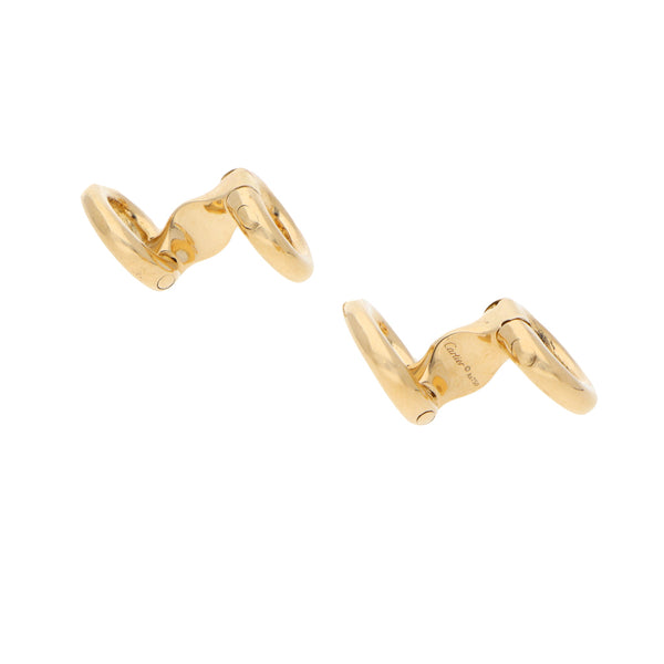 Mancuernillas diseño especial firma Cartier en oro amarillo 18 kilates.