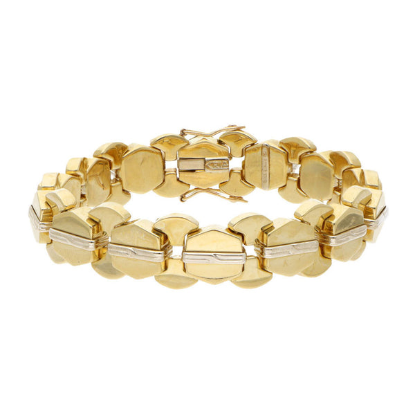 Pulsera eslabón articulado combinado en oro dos tonos 18 kilates.