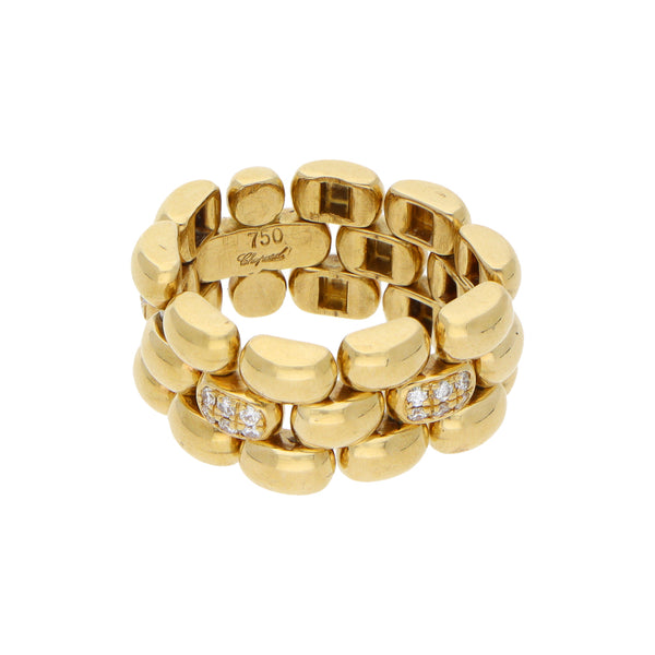 Argolla articulada con diamantes firma Chopard en oro amarillo 18 kilates.