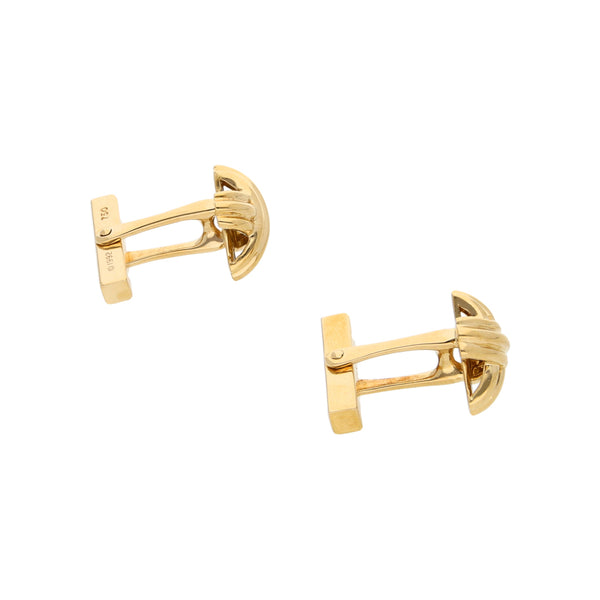 Mancuernillas acanaladas firma Tiffany & Co. en oro amarillo 18 kilates.