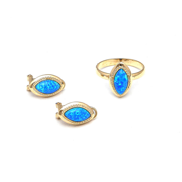 Juego de anillo y aretes diseño especial con ópalos azules en oro amarillo 14 kilates.