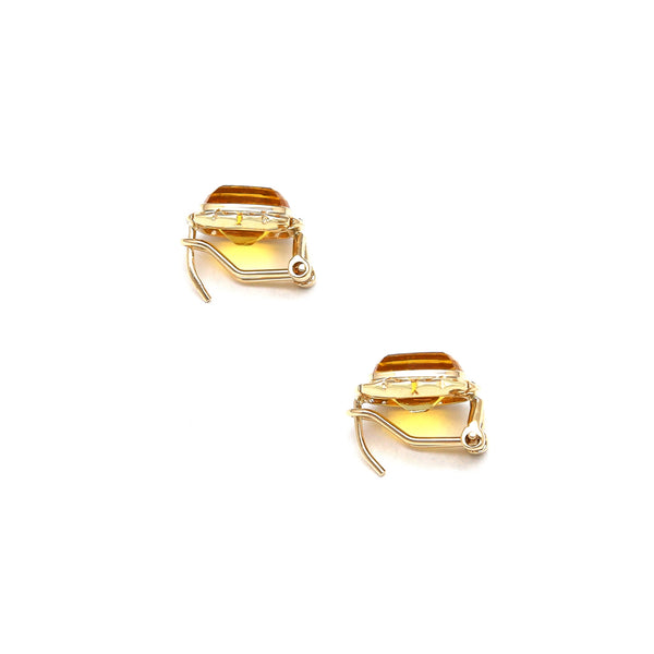 Aretes calados con citrinos en oro amarillo 14 kilates.