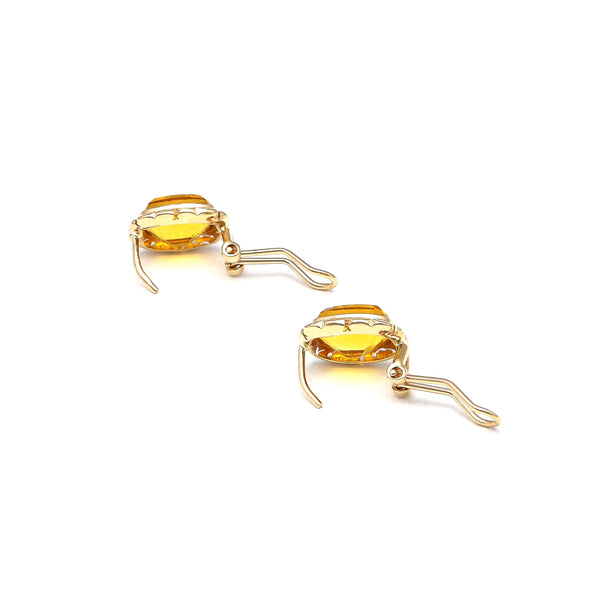 Aretes calados con citrinos en oro amarillo 14 kilates.