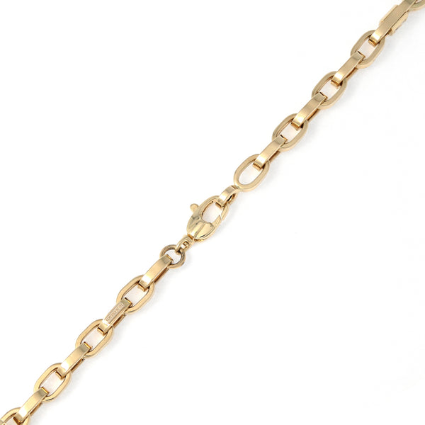 Collar eslabón cruzado combinado con circonias en oro amarillo 14 kilates.