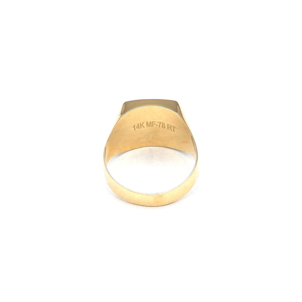 Anillo tipo sello en oro amarillo 14 kilates.