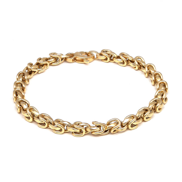 Pulsera eslabón combinado en oro amarillo 14 kilates.