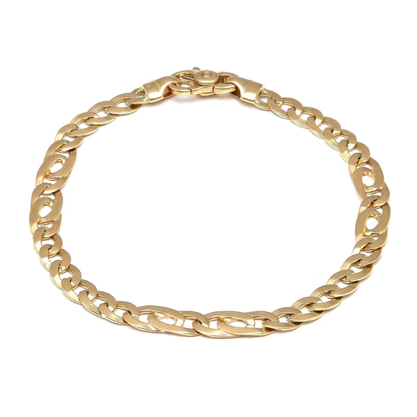 Pulsera eslabón combinado en oro amarillo 14 kilates.