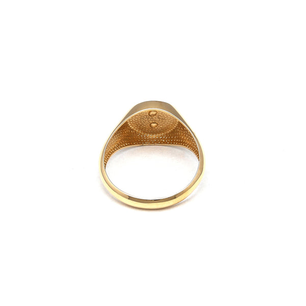 Anillo tipo sello en oro amarillo 14 kilates.