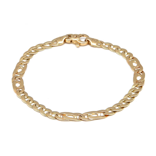 Pulsera eslabón combinado en oro amarillo 14 kilates.