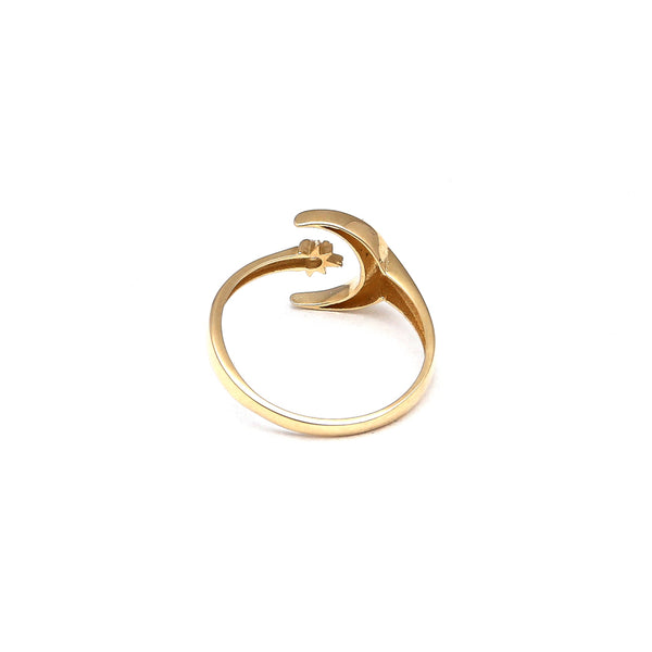 Anillo abierto motivo luna con circonia en oro amarillo 14 kilates.