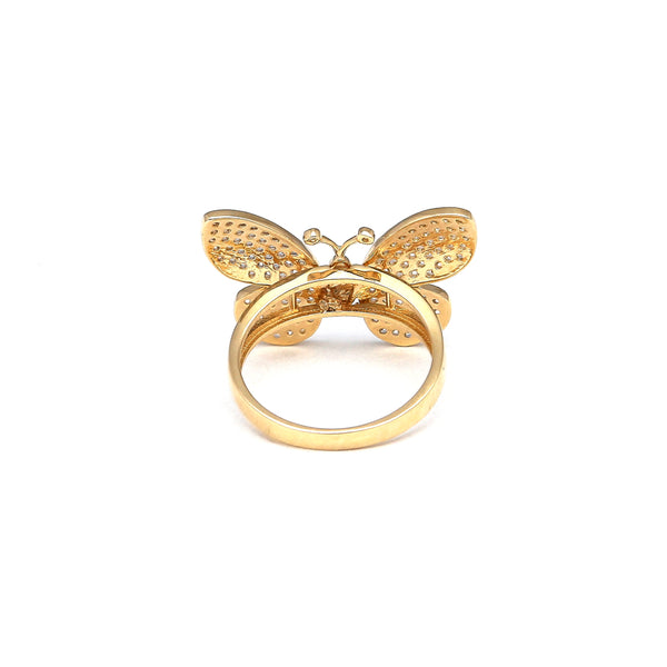 Anillo estilizado motivo mariposa con circonias en oro amarillo 14 kilates.