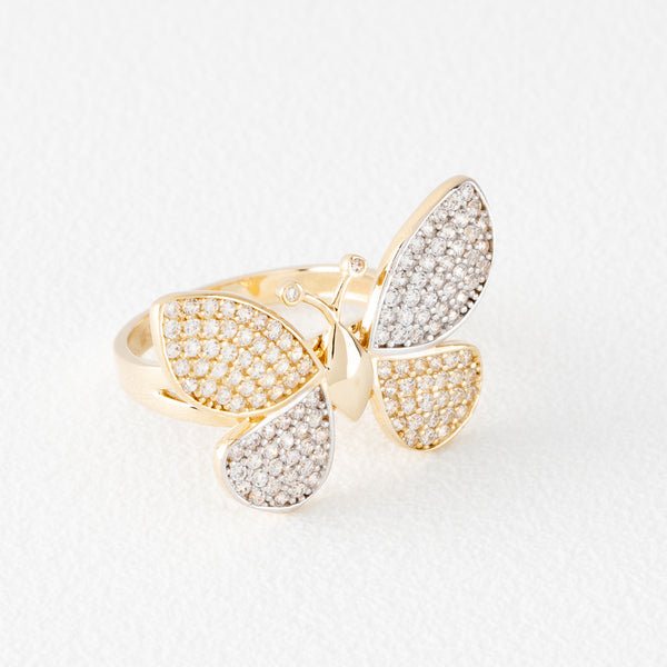 Anillo estilizado motivo mariposa con circonias en oro amarillo 14 kilates.