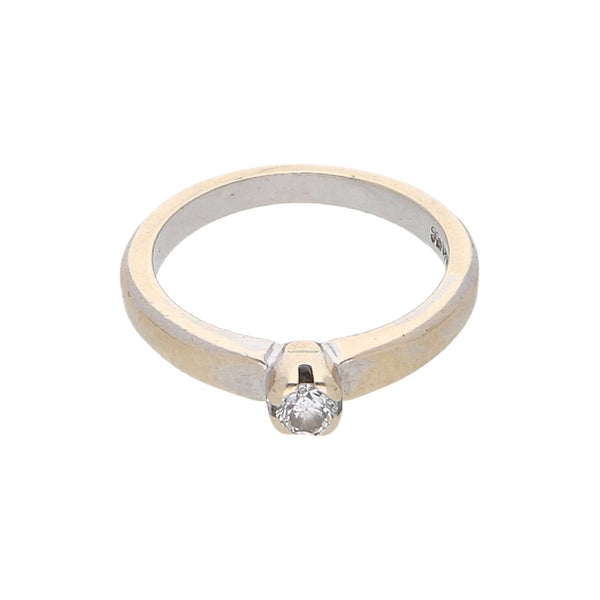 Anillo solitario con diamante en oro blanco 14 kilates.