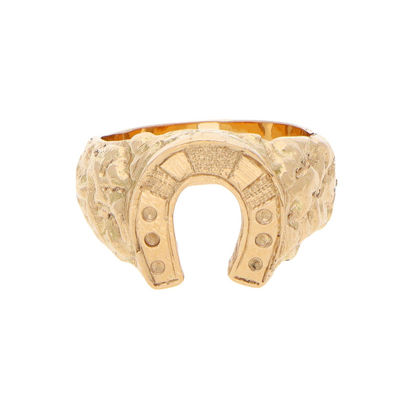 Anillo barroco motivo herradura en oro amarillo 18 kilates.