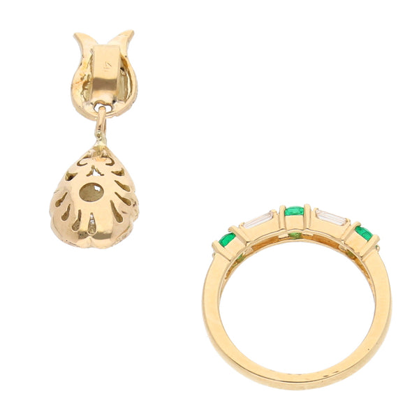 Juego de anillo diseño especial y dije estilizado con diamantes y esmeraldas en oro amarillo 14 kilates.