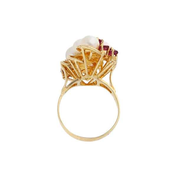 Anillo diseño especial con perlas y rubíes en oro amarillo 14 kilates.