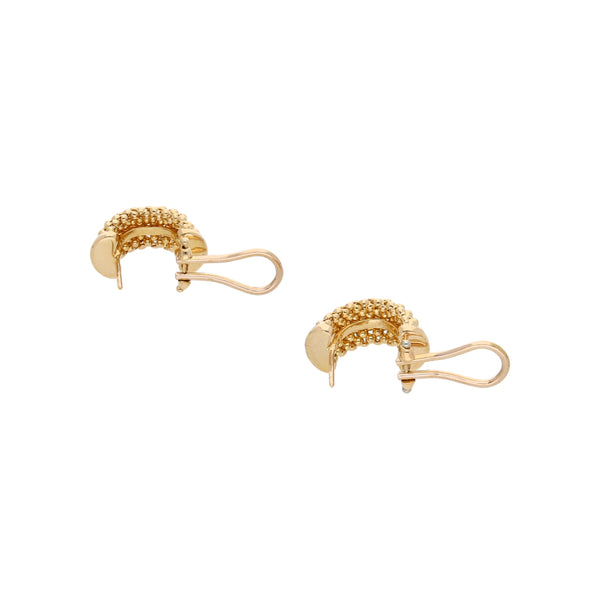 Aretes boleados en oro amarillo 14 kilates.