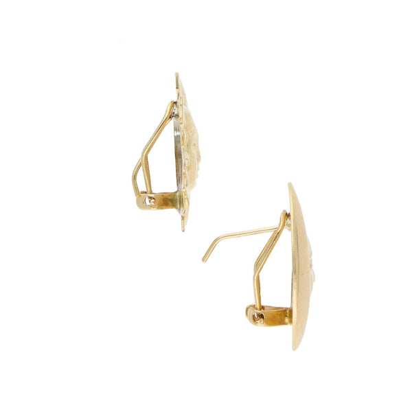 Aretes huecos motivo sol y luna en oro amarillo 14 kilates.