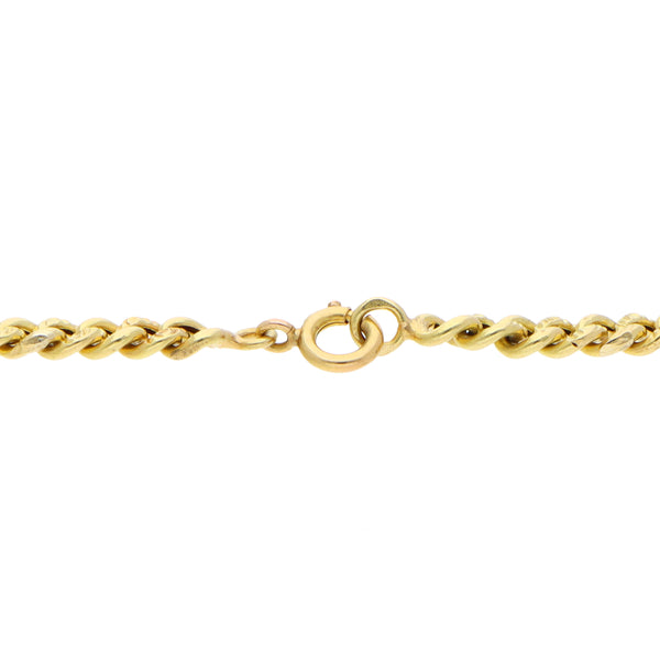 Pulsera eslabón barbado en oro amarillo 18 kilates.